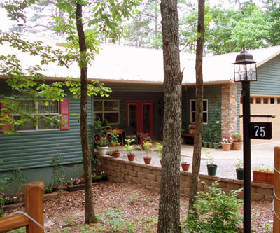 Sunny Oaks Casita Studio is located on the lower walkout level of our hillside home.