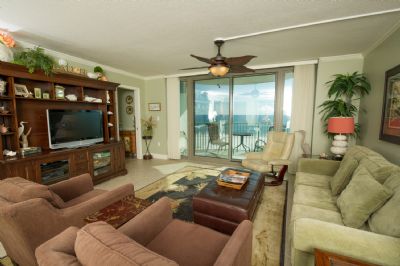 Gulf Front Living Room with LCD TV opens to balcony