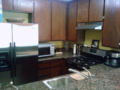 Closeup of Kitchen. Brand new stainless steel appliances... Closeup of Kitchen. Brand new stainless steel appliances...