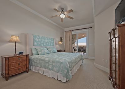 Master bedroom with sliding glass doors to oversize balcony