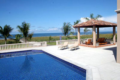 Pool and ocean view of rear deck and gazebo. 