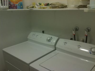 Full Size Washer and Dryer in Storage Room. Full Size Washer and Dryer in Storage Room.