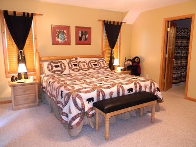Downstairs bedroom with queen