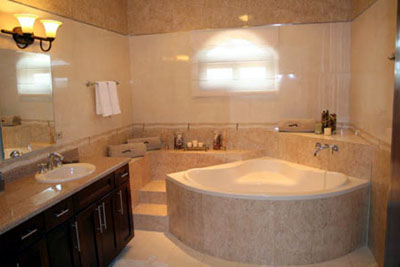 Master bath with spa tub, 2 sinks and larghe shower. 