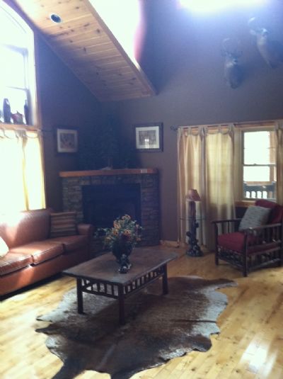 Loft view of great room with fireplace