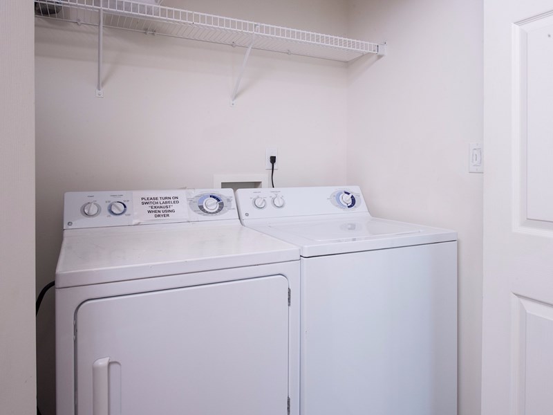 Full Size Washer and Dryer.  Iron and Ironing Board.