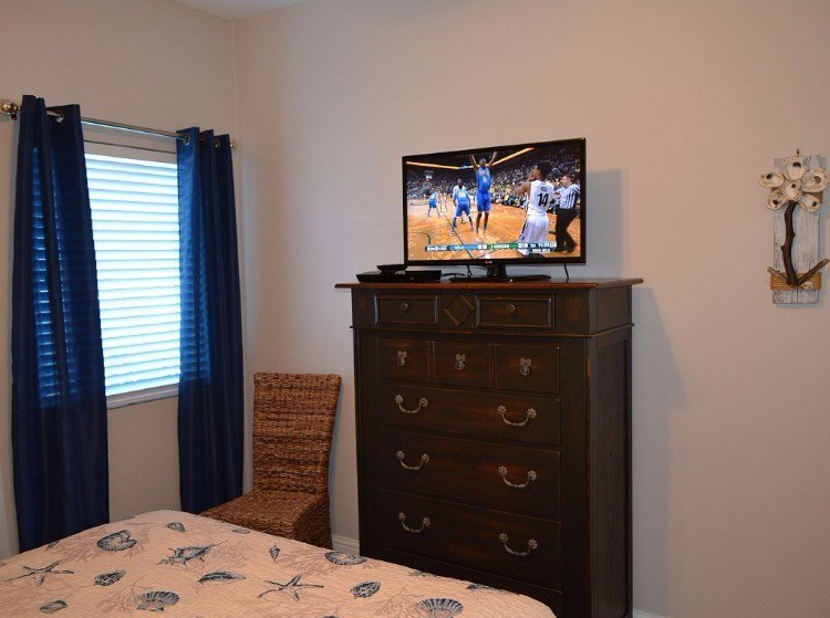 Guest bedroom equipped with HDTV and DVD