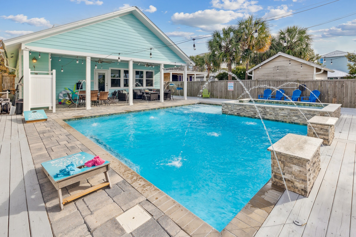 The salt-water pool has deck jets,fountains,waterfalls, and sun shelf