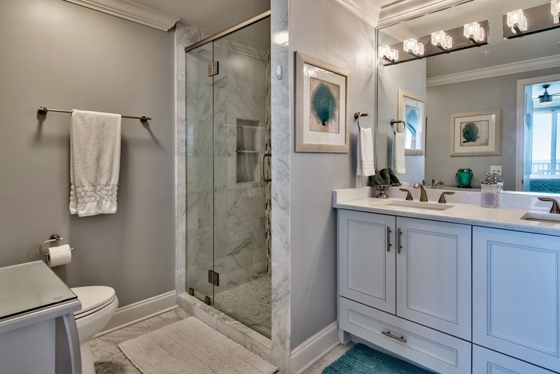 Master bathroom comes with double vanity and walk-in shower.