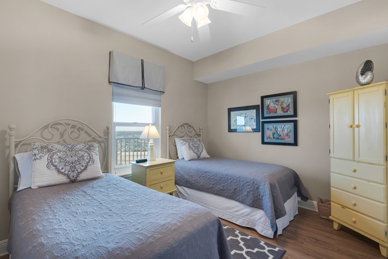 two twin beds in guest bedroom