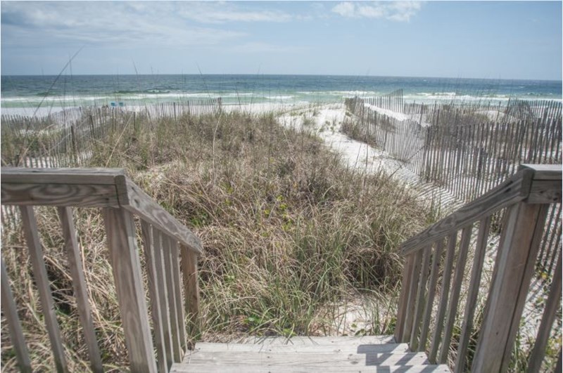 Stairs leading you to the white sandy beaches