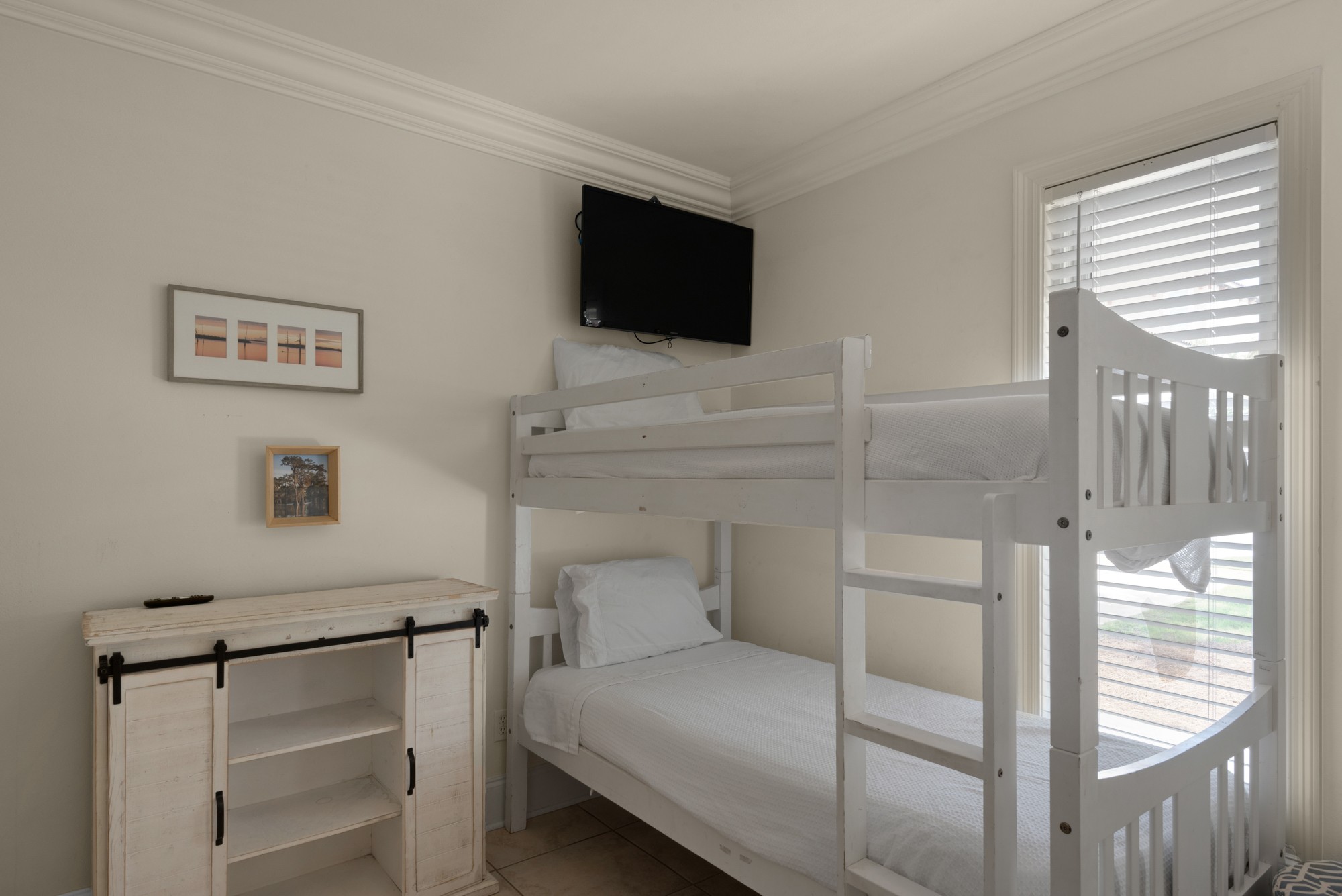 first floor front bedroom has two sets of bunks twin/twin and twin/full - shared hall bath