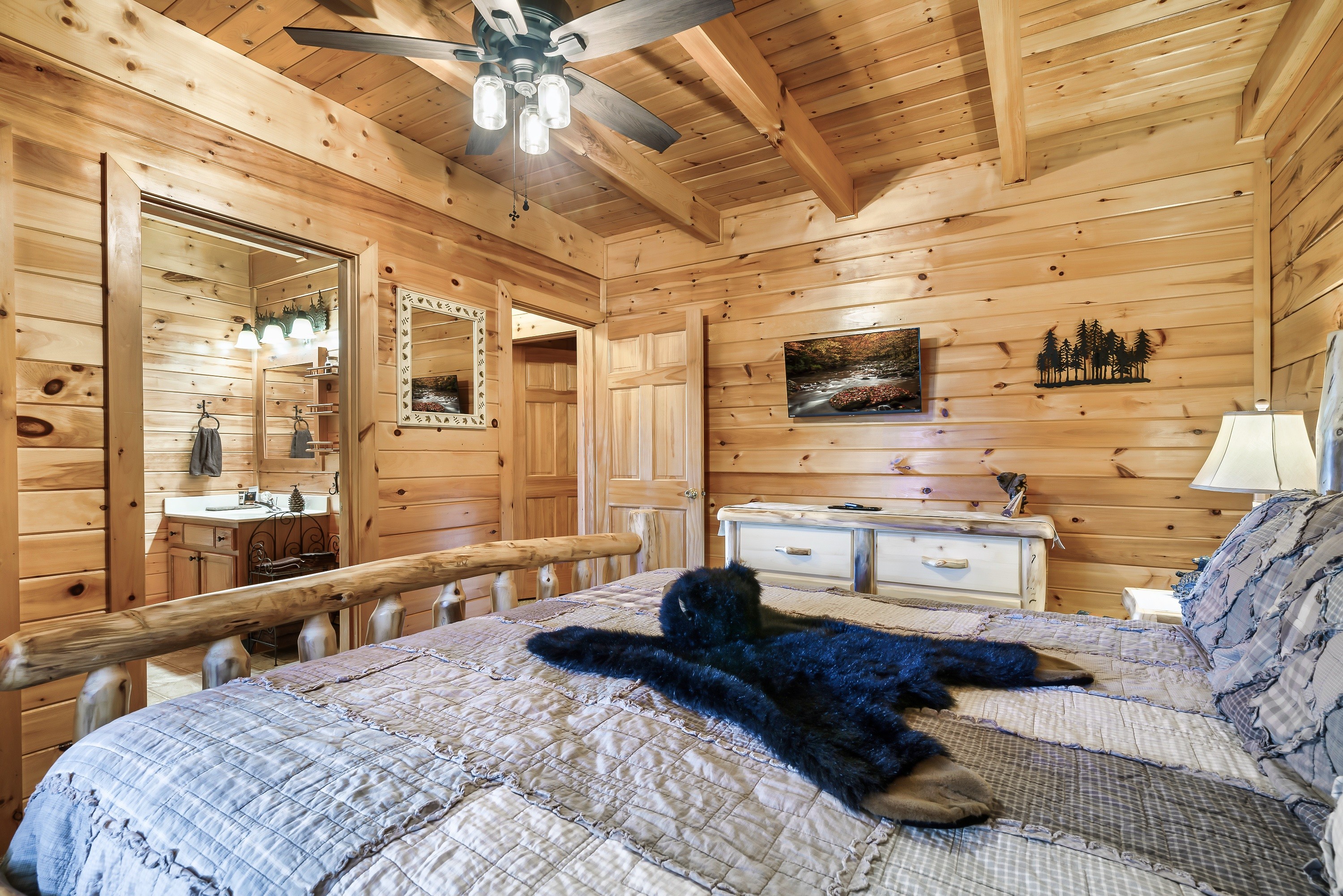 Our Gorgeous aspen log KING bedroom with attached bath