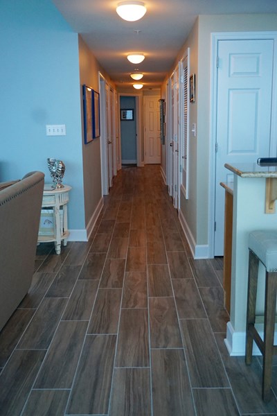 New designer plank floors and freshly painted in coastal calming colors