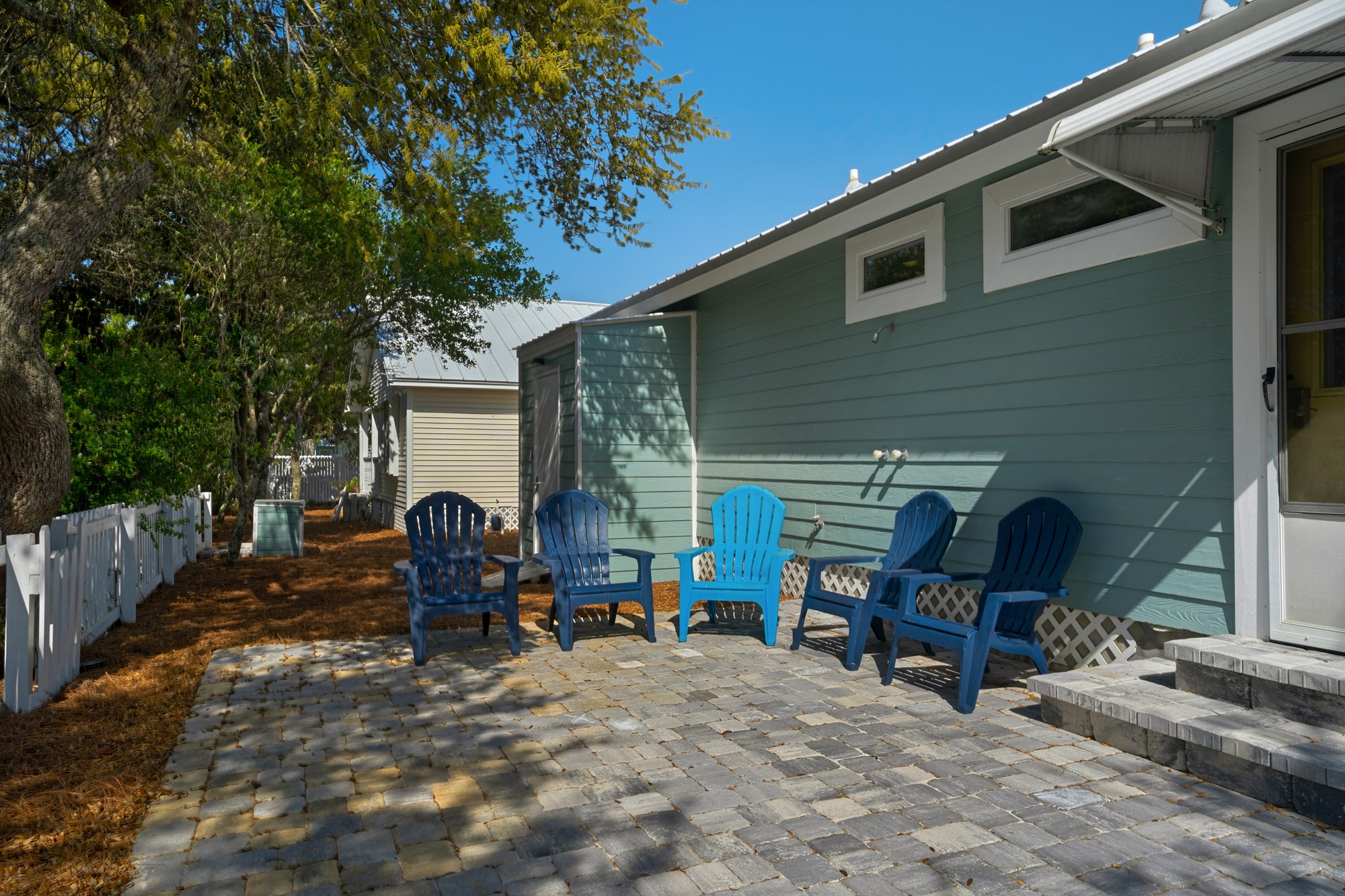 back patio also has, extra lounge chairs and a outdoor shower for your use