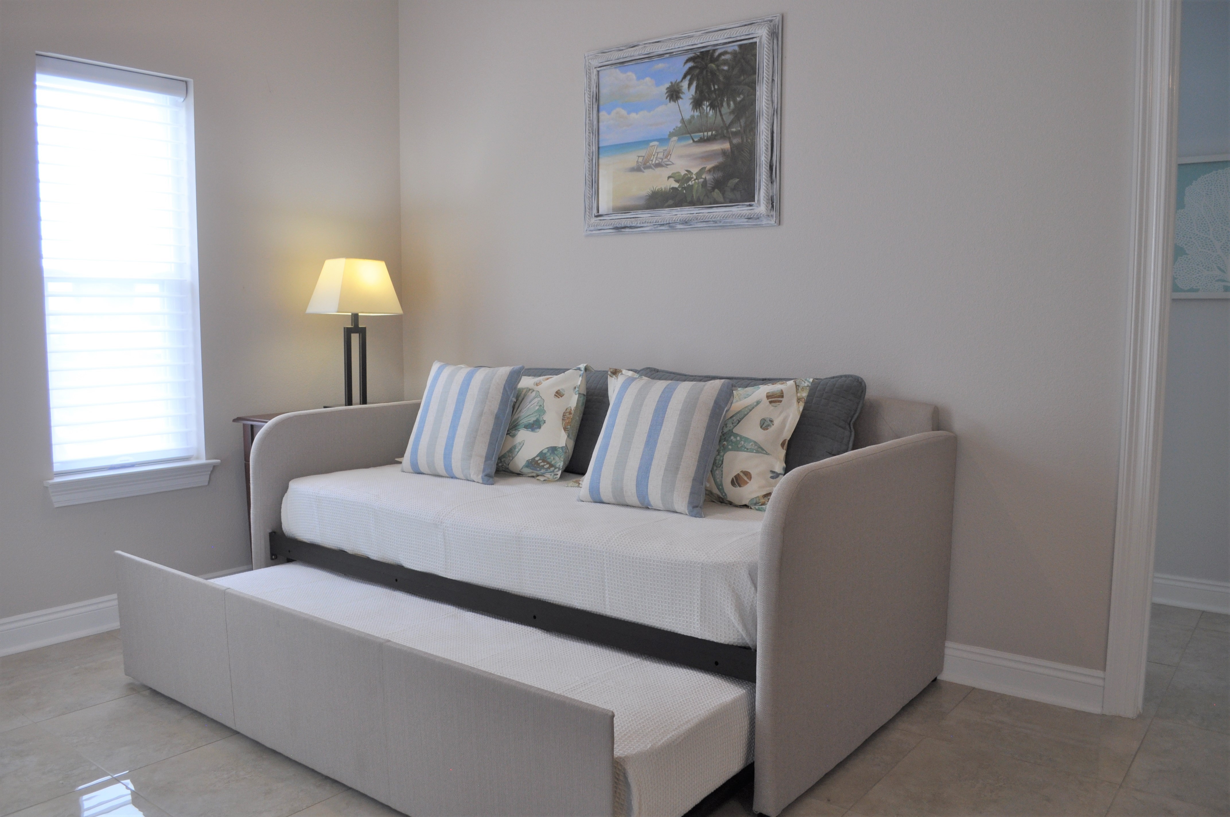 Master suite sitting area with double twin sofa daybed