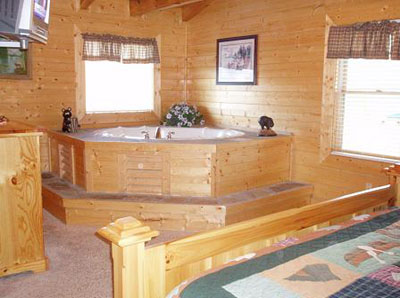 Relax in the jacuzzi tub in the Master Bedroom