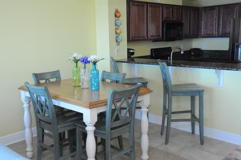 Enjoy meals from the Kitchen while taking in views of the Gulf (Seating for 6)