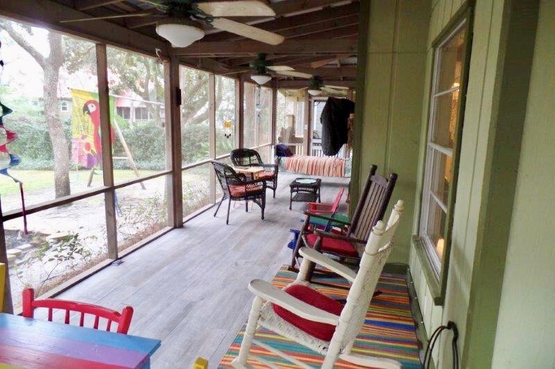 Beautiful back porch for relaxing and dining
