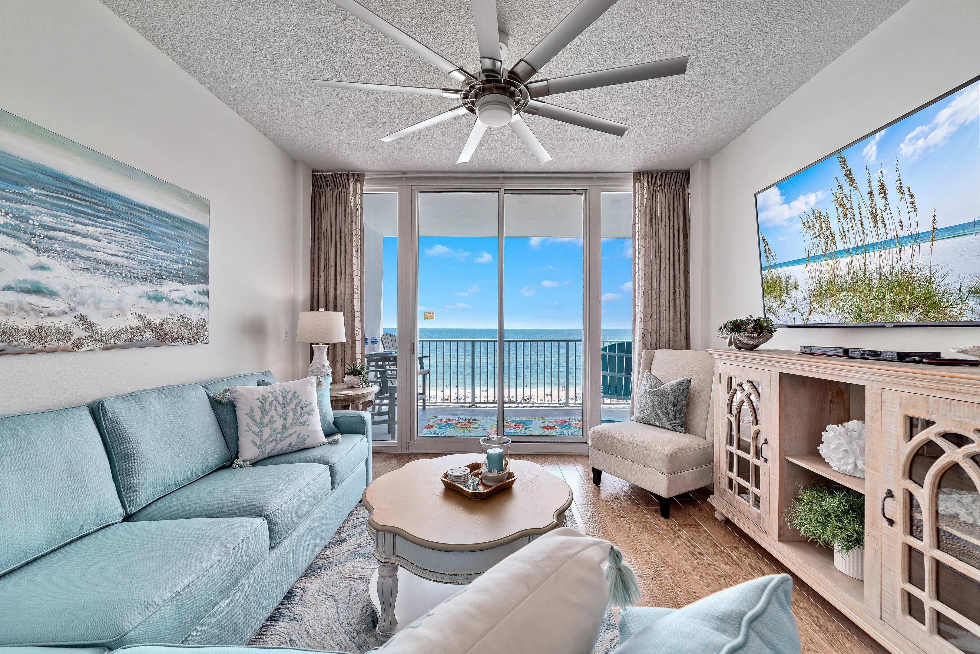 Living Room with 70-inch Smart TV and Beachfront View